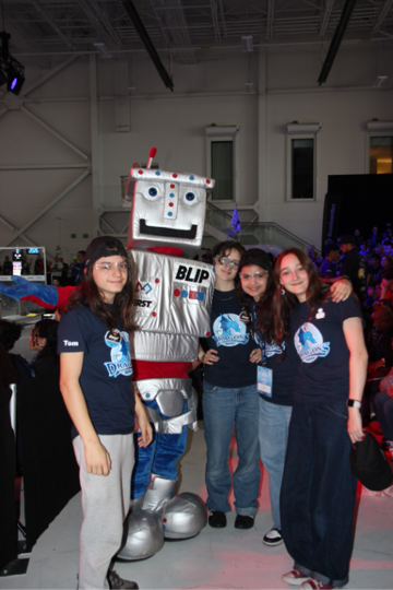 Les Dragons avec leur robot à la compétition FRC